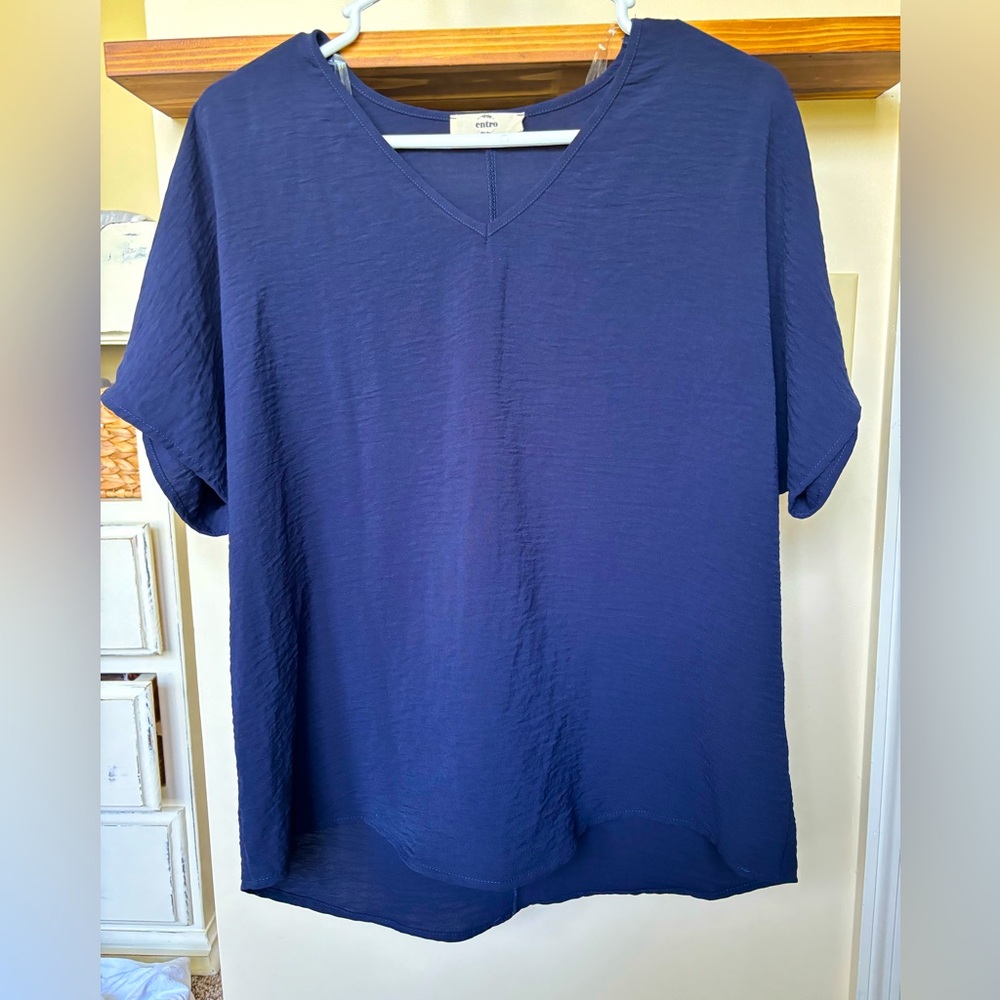 Boutique style blouse. Navy Size small, loose fitting, fits more like a medium